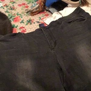 Black stonewash jeans with silver studs on front